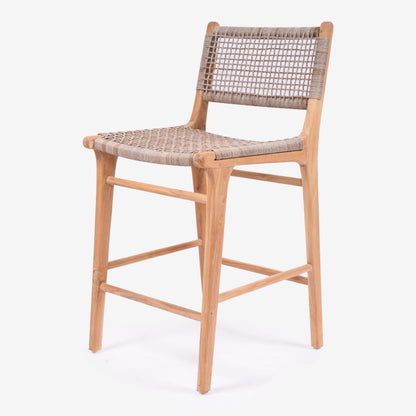 Angled front studio view of the Zen Bar Stool – Washed Grey – Open Weave focusing on sculpted legs and ergonomic seat.