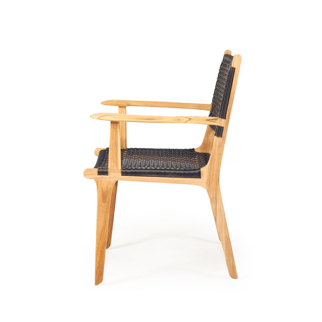 Side-on view of Zen Armchair – Black – Open Weave emphasizing the curved arm design and handwoven detail.