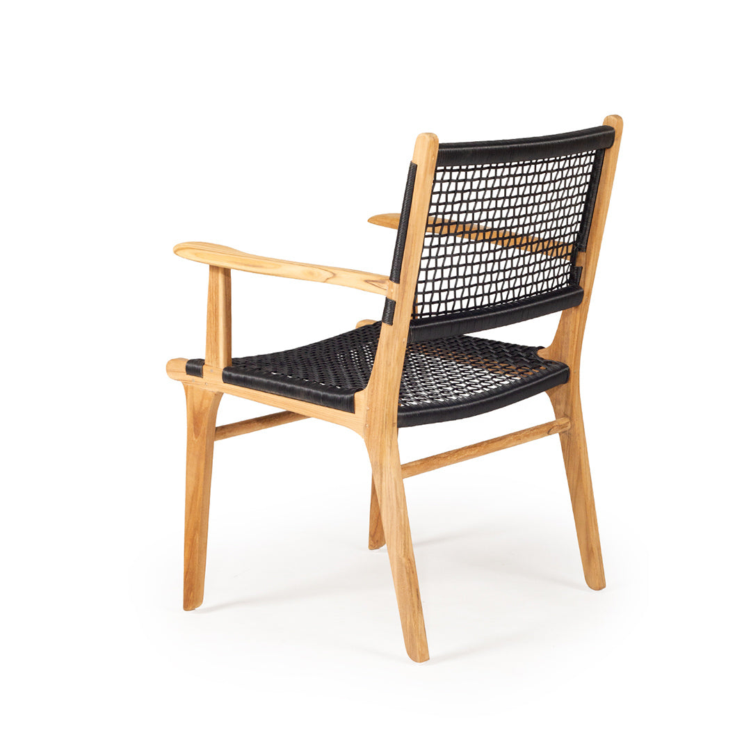 Back-angle view of Zen Armchair – Black – Open Weave showing gently curved arms and open weave texture.
