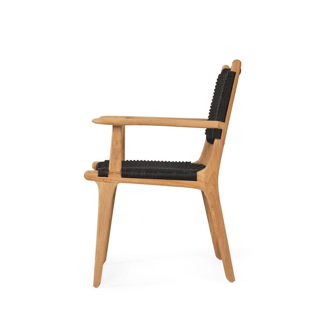 Side profile of Zen Armchair – Black – Close Weave on white background showing teak arms and woven seat.