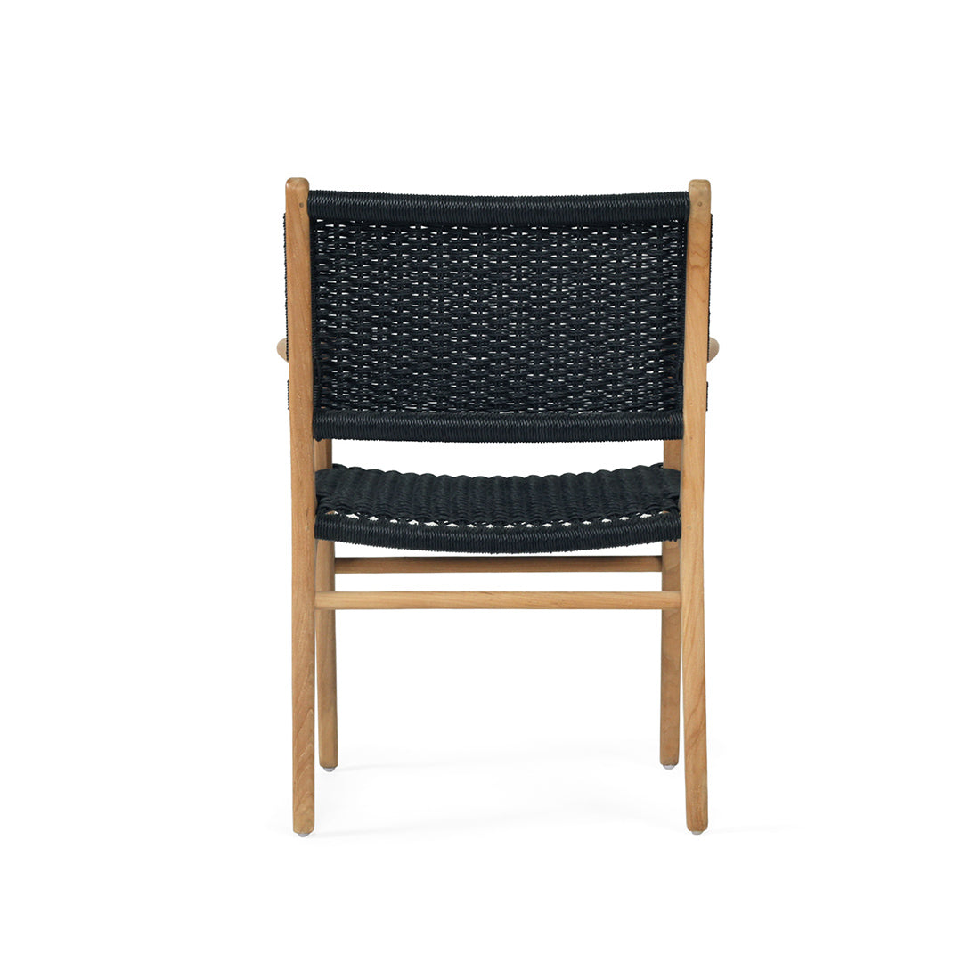 Rear view of Zen Armchair – Black – Close Weave displaying the full backrest and contoured seat over a natural timber frame.