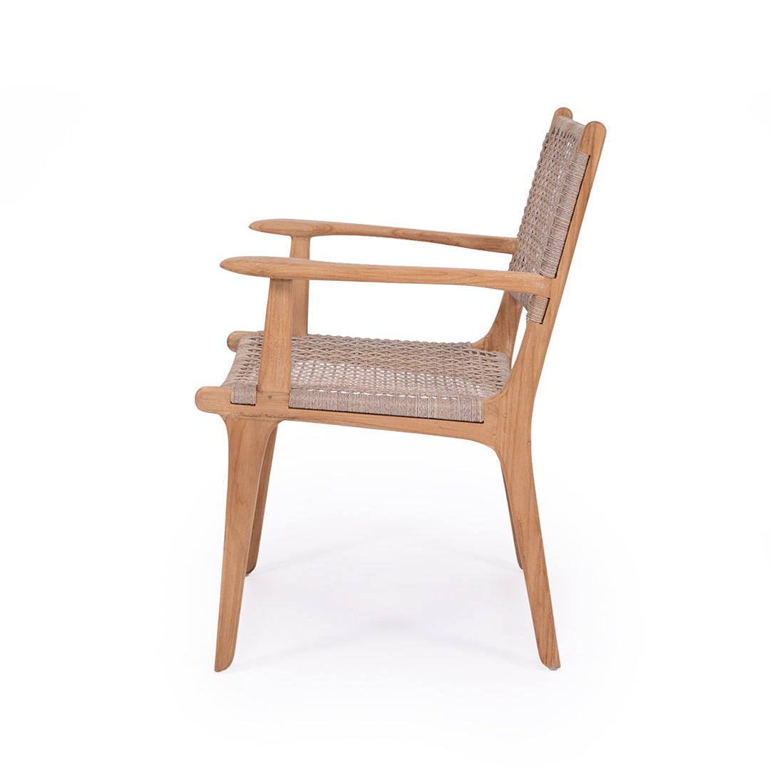 Side profile of Zen Armchair – Washed Grey – Open Weave emphasizing sculpted arms and woven seat structure.