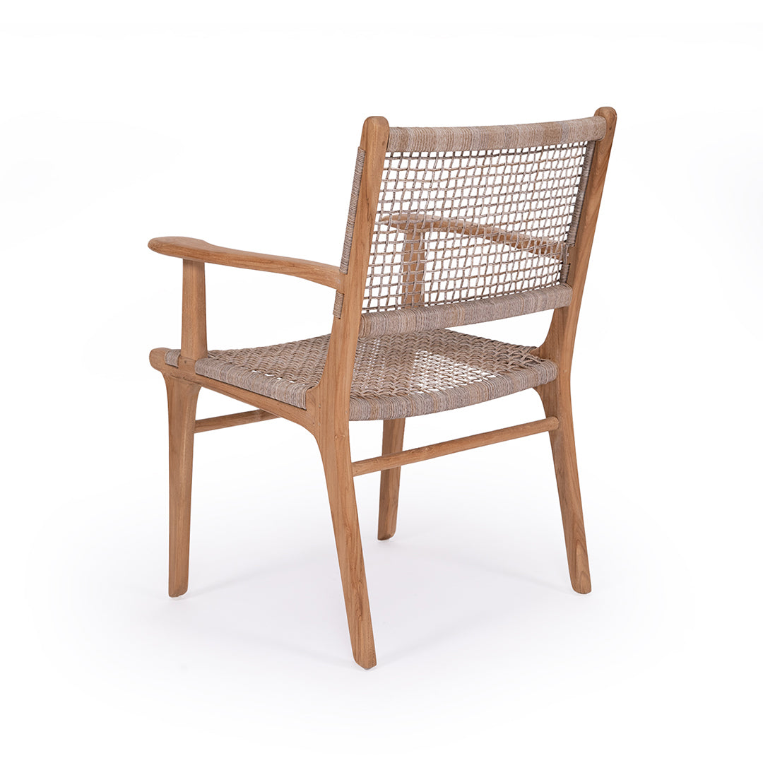 Angled back perspective of Zen Armchair – Washed Grey – Open Weave revealing arm curves and weave depth.