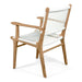 Angled rear view of Zen Armchair – White – Open Weave displaying sculpted arms, teak grain, and airy open weave.