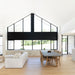 Wide view of a modern living and dining area featuring the Zen Dining Chair – Washed Grey – Open Weave and large windows.