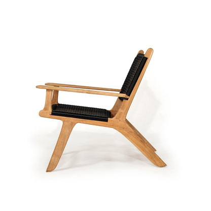 Side profile of Zen Lazy Chair in Black featuring ergonomic design, solid teak arms, and open rope weaving.