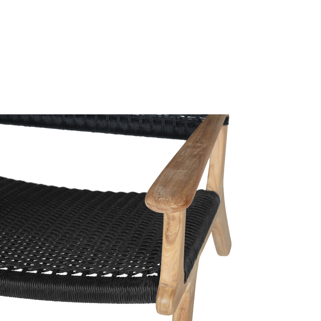 Angled detail of black woven seat and teak armrest of Zen Lazy Chair – Black – Close Weave.