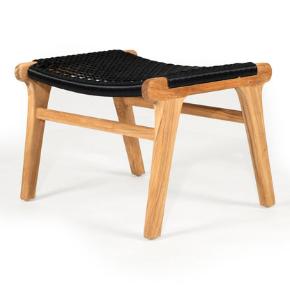 Angled front view of the Zen Lazy Chair Ottoman - Black - Open Weave, featuring a handwoven black rope seat in an airy grid pattern over a solid teak wood frame with flared legs and crossbar supports.