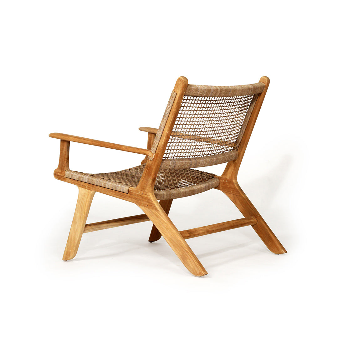 Rear-side perspective of the Zen Lazy Chair - Sand - Open Weave showing the airy, handcrafted rope weaving and angled teak frame, ideal for relaxed seating with a modern-rustic look.