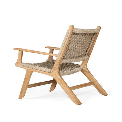 Rear angled perspective of the Zen Lazy Chair - Sand - Close Weave, highlighting the smooth armrests, sculpted teak frame, and densely woven sand-tone rope covering both the seat and backrest.