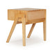 Back angled view of the Castaway Bedside Table with natural timber frame and rear leg detail