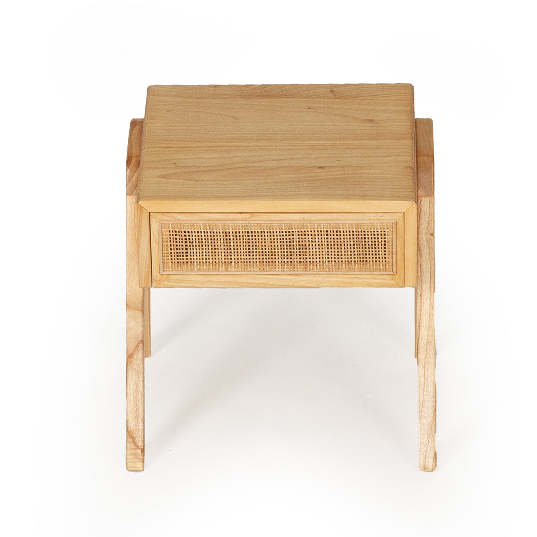Front view of the Castaway Bedside Table showing natural timber finish and rattan drawer detail