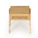 Front view of the Castaway Bedside Table showing natural timber finish and rattan drawer detail
