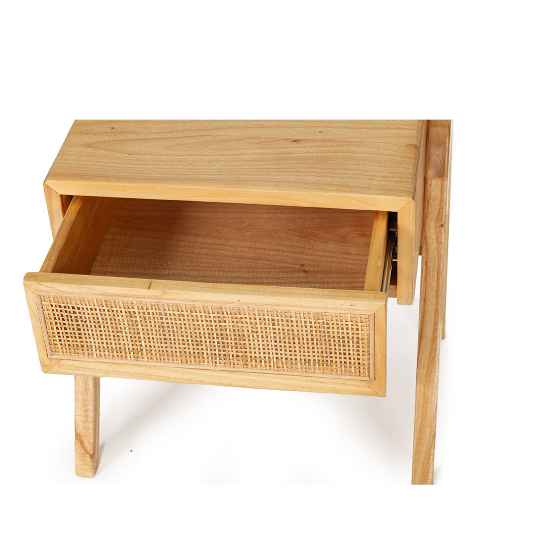 Close-up of the Castaway Bedside Table open drawer with woven rattan front and timber interior