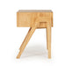 Side view of the Castaway Bedside Table showing natural timber construction and angled leg design