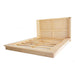 Angled view of the Castaway King Bed natural timber platform frame with slat base and rattan headboard