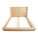 Castaway King Bed frame in natural timber shown without slats, featuring woven rattan headboard