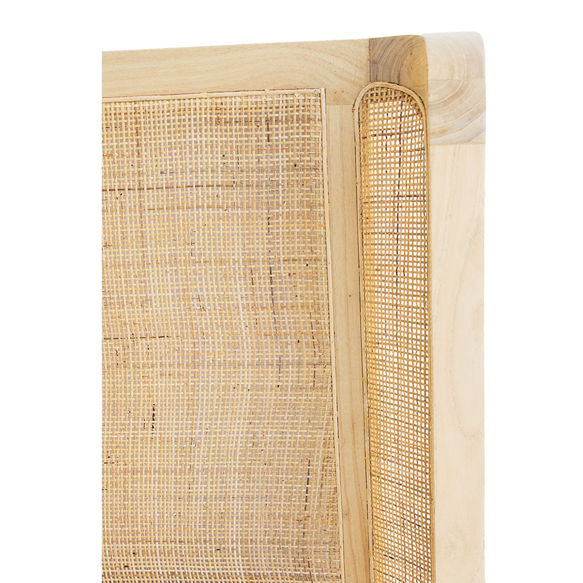 Close-up of the Castaway King Bed woven rattan headboard and rounded natural timber frame