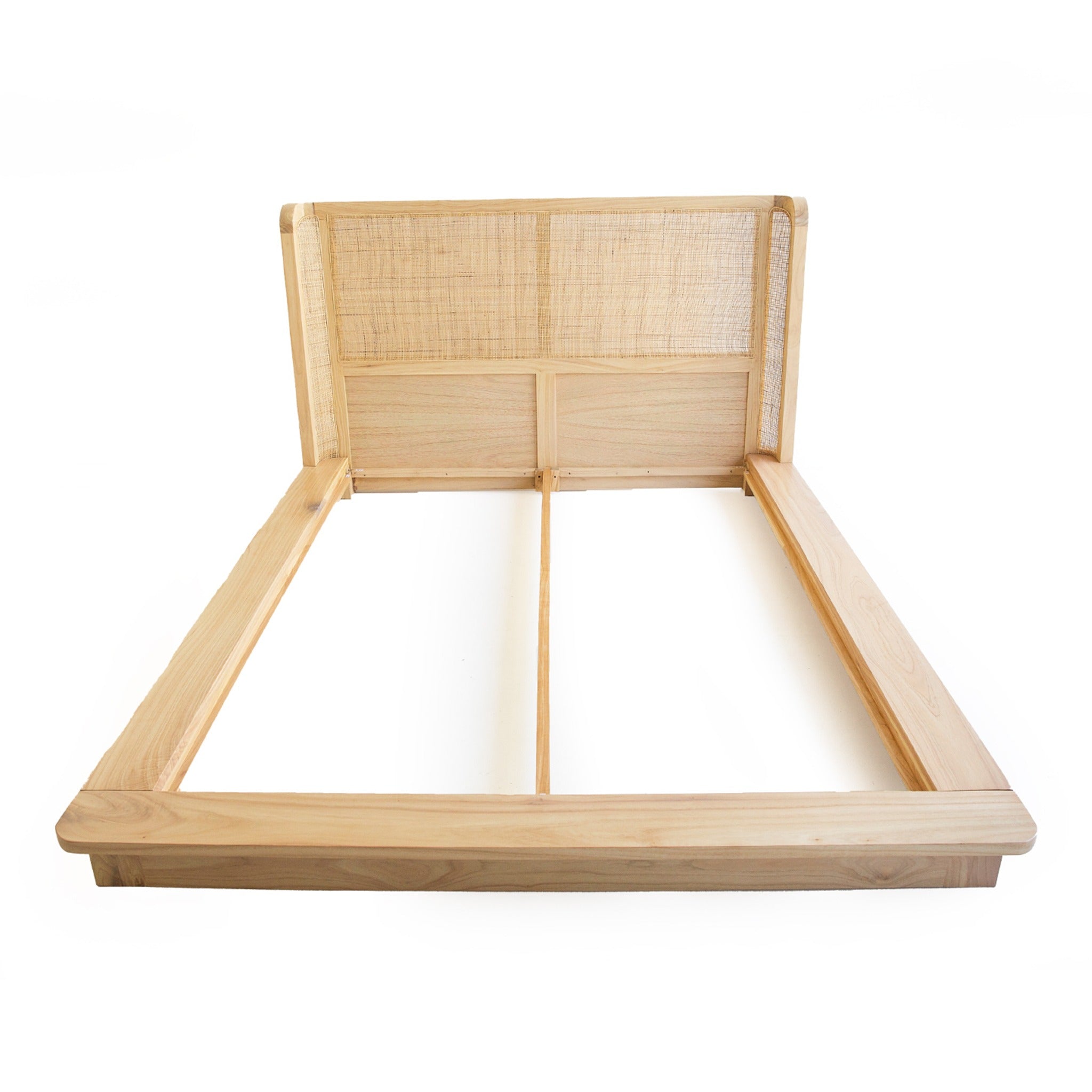Castaway Super King Bed frame in natural timber shown without slats, featuring woven rattan headboard