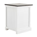 Angled view of Halifax Accent white bedside drawer unit with dark timber top and classic panel detail