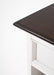 Close-up of Halifax Accent bedside table dark timber top edge and white panel detail