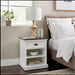 Halifax Accent bedside table with shelves styled beside bed in coastal bedroom