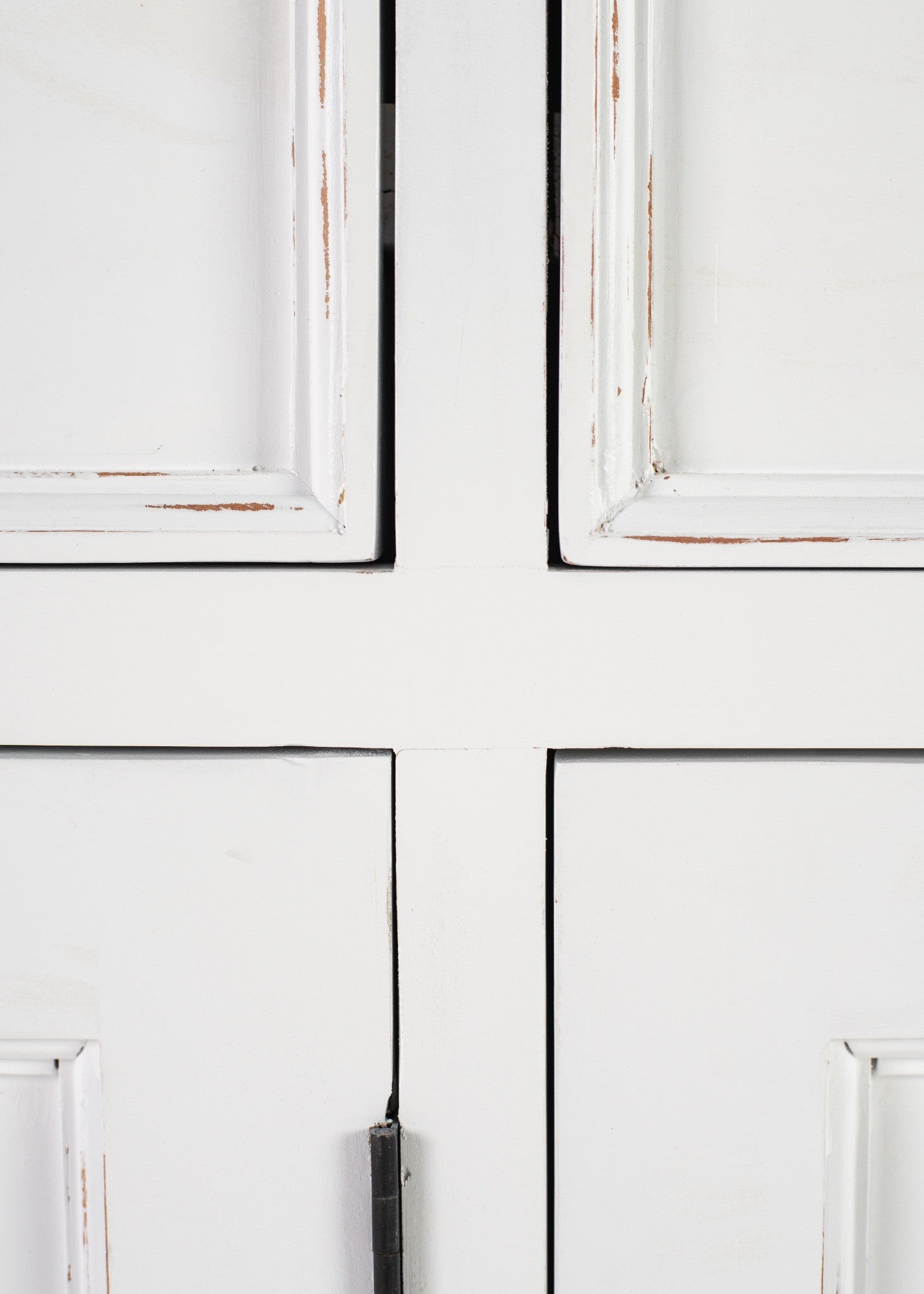 Halifax Accent Buffet close-up of distressed white painted cabinet doors with moulded panel detail and vintage coastal finish.