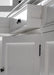 Halifax Buffet Hutch Unit with 4 Glass Doors close-up of open drawer, white painted door panels, black hinge hardware and cabinet moulding detail.