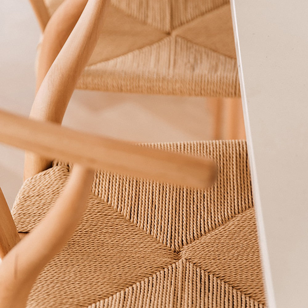 Wishbone Counter Stool in Natural Oak close up showing the handwoven cord seat pattern and smooth timber stool frame.