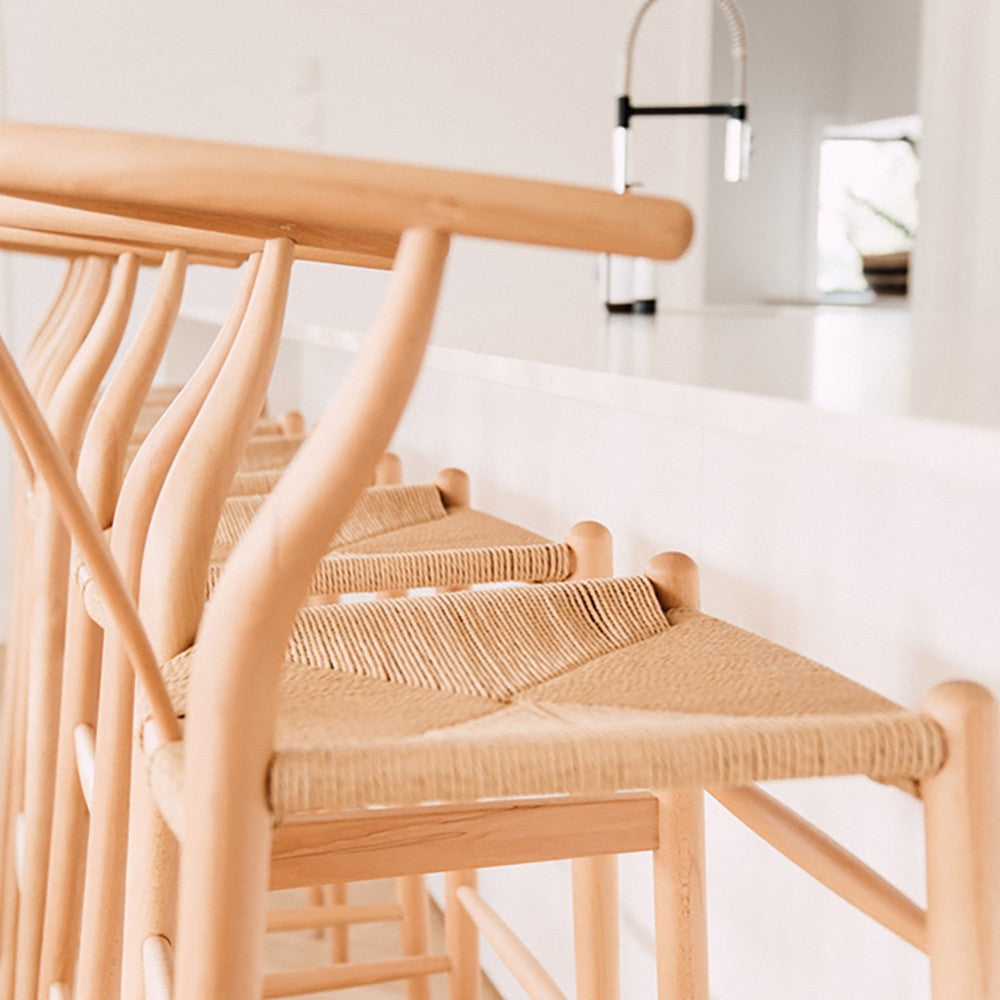 Wishbone Counter Stool in Natural Oak detail of the woven natural cord seat pattern with warm timber frame.