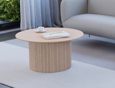 Poppy round wood coffee table with ridge base and natural wood finish